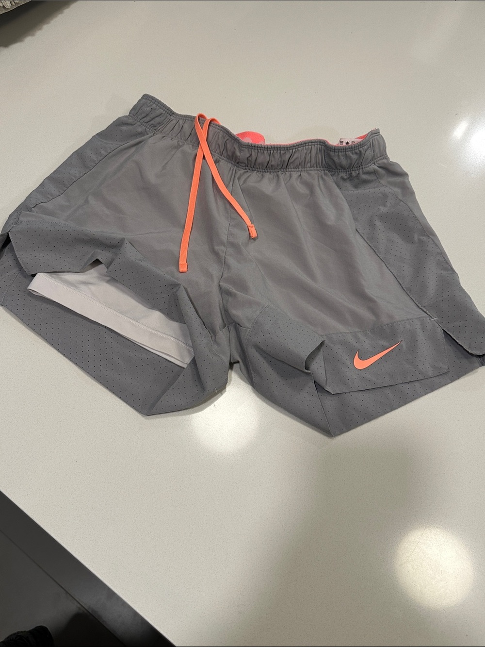 Nike Gray Shorts with Neon Coral Drawstring and Swoosh